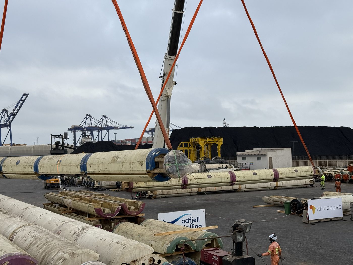 Crane and rigging spread handling rig tubulars on the quay at the Afrishore Walvis Bay supply base