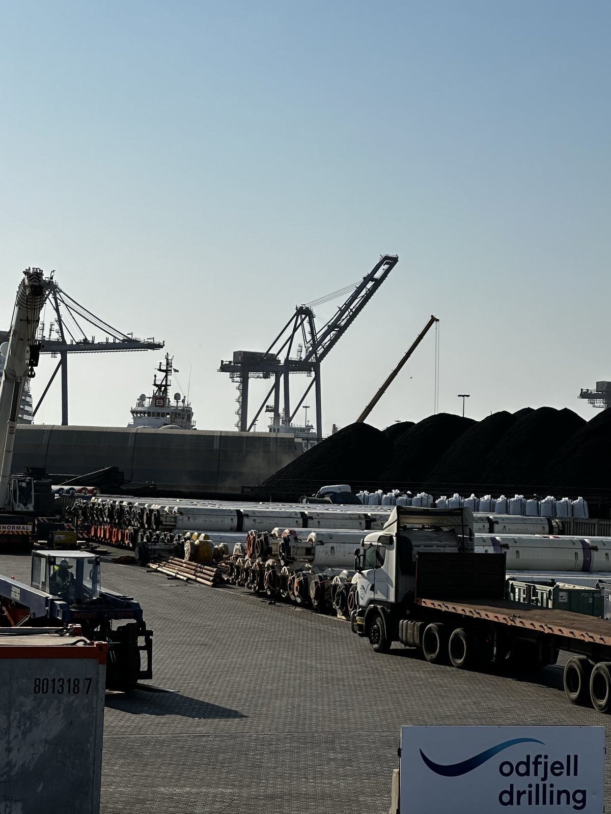 Afrishore's Walvis Bay logistics base – mobile crane and rigging spread handling rig tubulars on the Port of Walvis Bay apron, Namibia