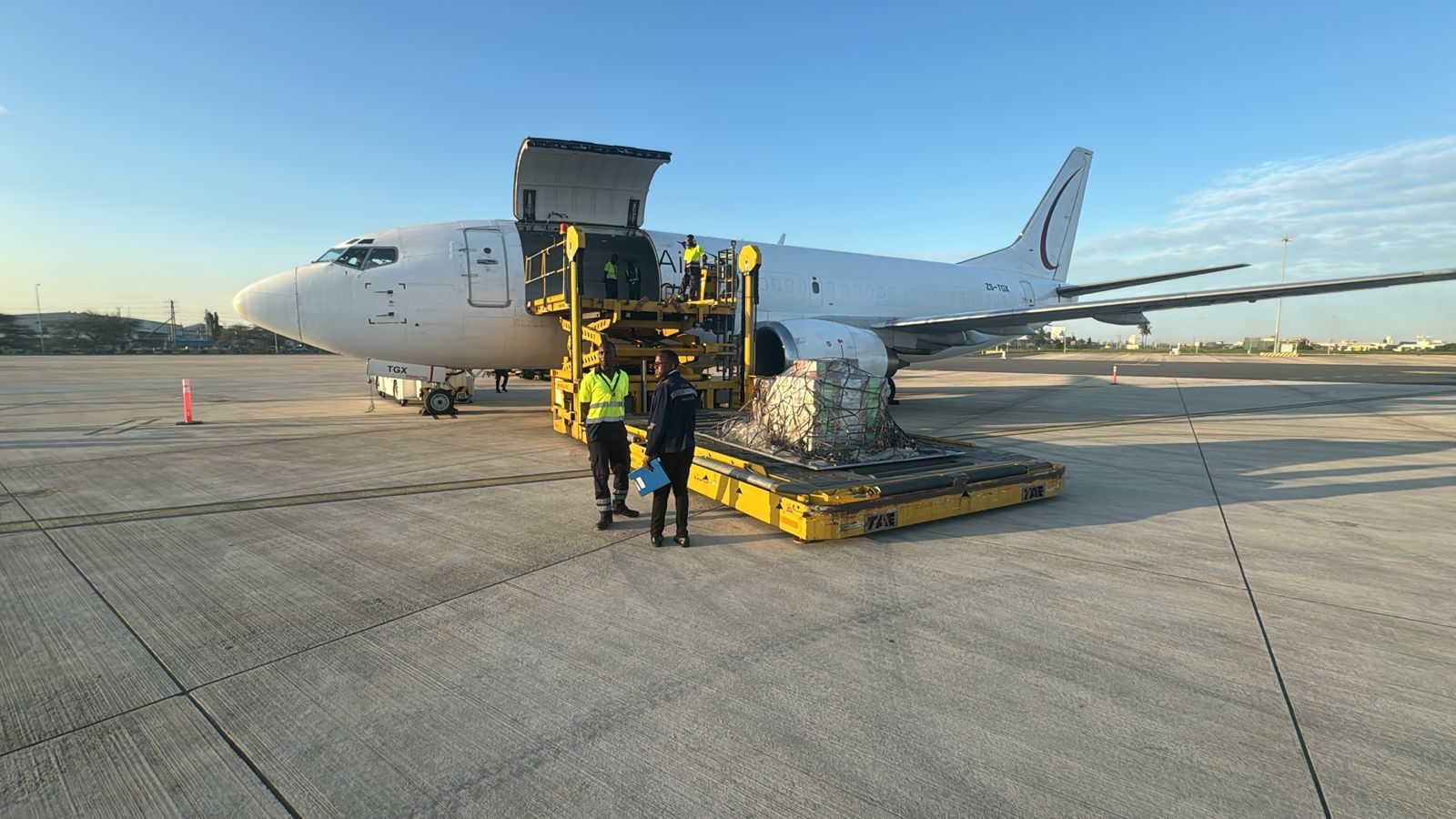 Multi-class explosives charter consignment on the cargo loader at Dar es Salaam, late afternoon 11 October 2024 – minutes after off-load from the Afrishore-arranged South African charter; urgent air movement of Hazard Class 1 articles from O.R. Tambo to Tanzania for Baker Hughes.